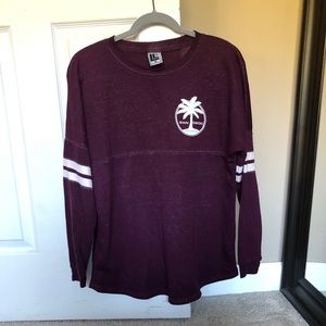 Purple long sleeve from a small shop in San Diego.